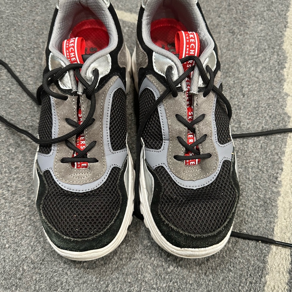 Skechers woman’s Black and Grey Athletic Shoes